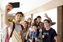 Students posing for group selfie Stock Photo - Alamy